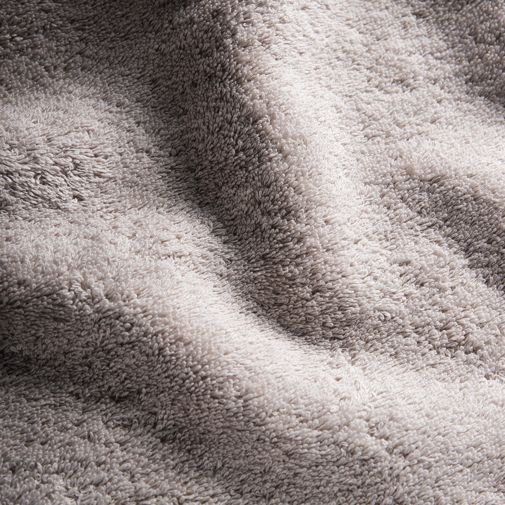 Detailed texture of Giza towel highlighting soft cotton loops and absorbent finish.