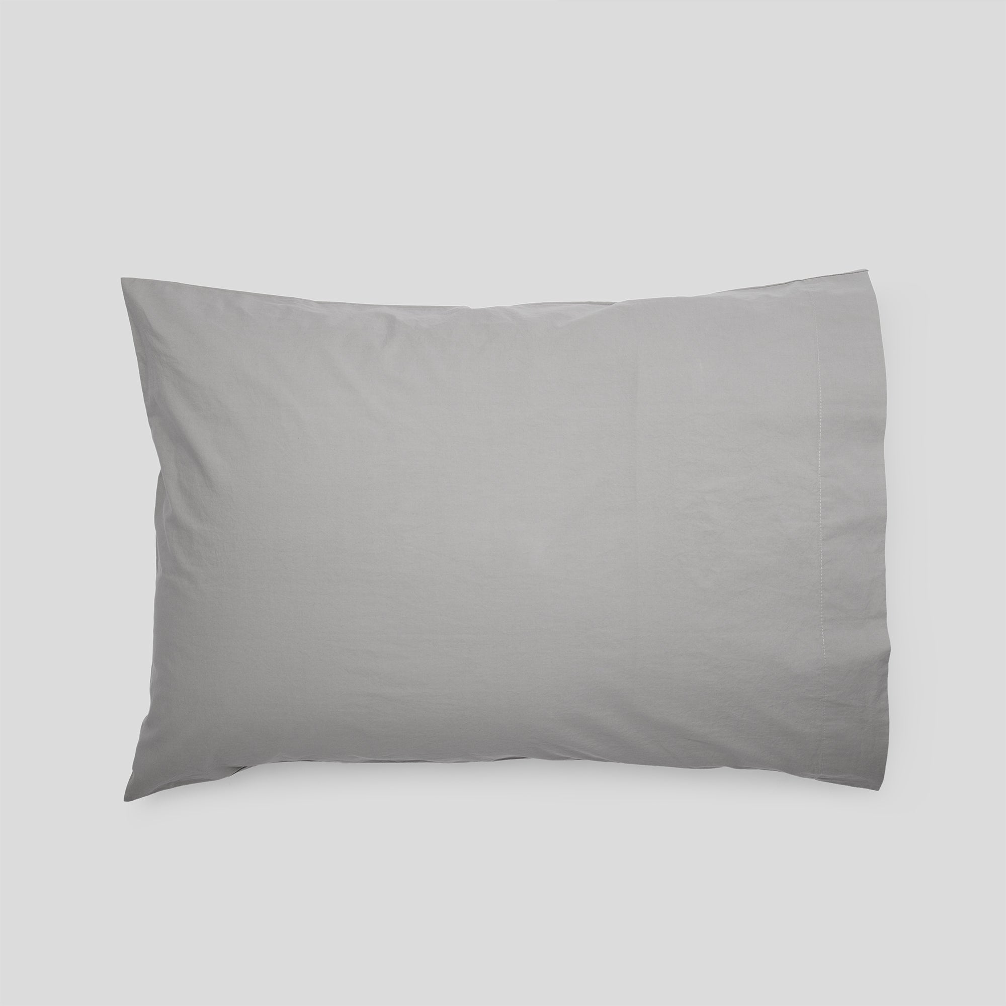 Mist grey organic cotton pillowcase for elegant bedding and modern interiors.