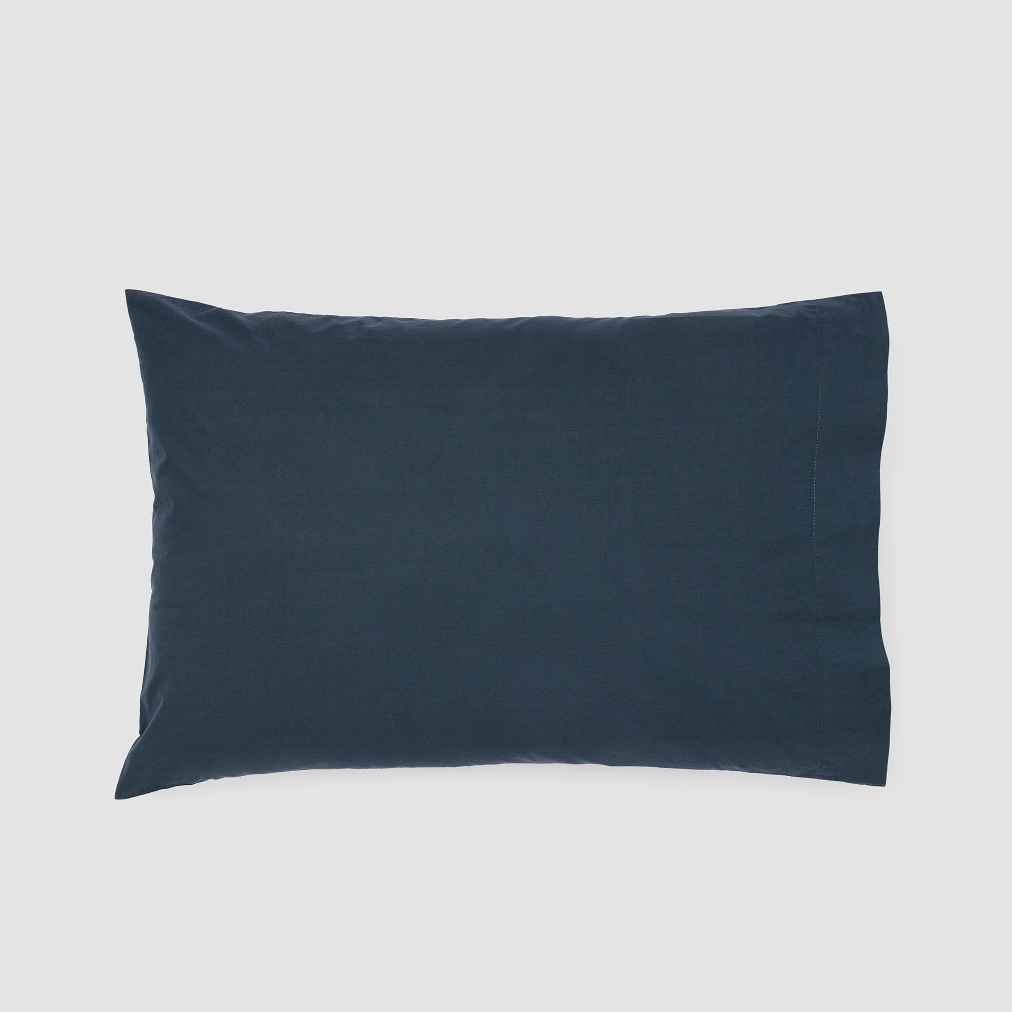 Atlantic blue organic cotton pillowcase for elegant bedding and modern interiors.